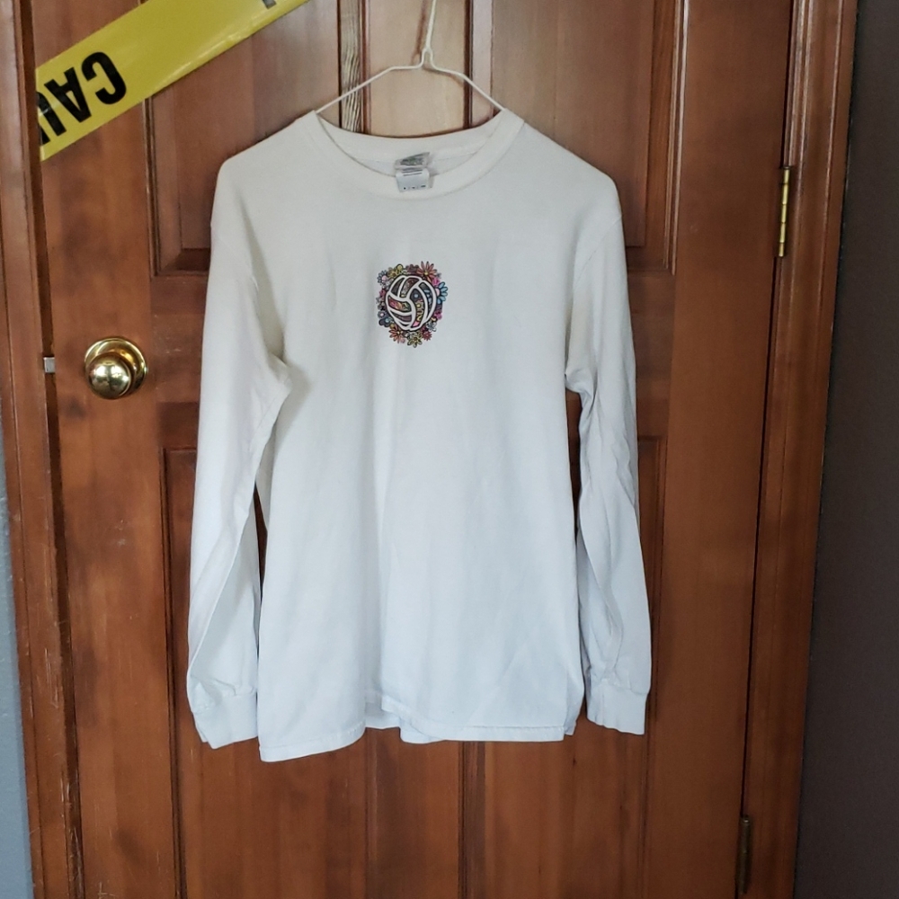 White long sleeve with a volleyball